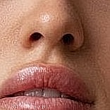 Close-up of lips and nose area.