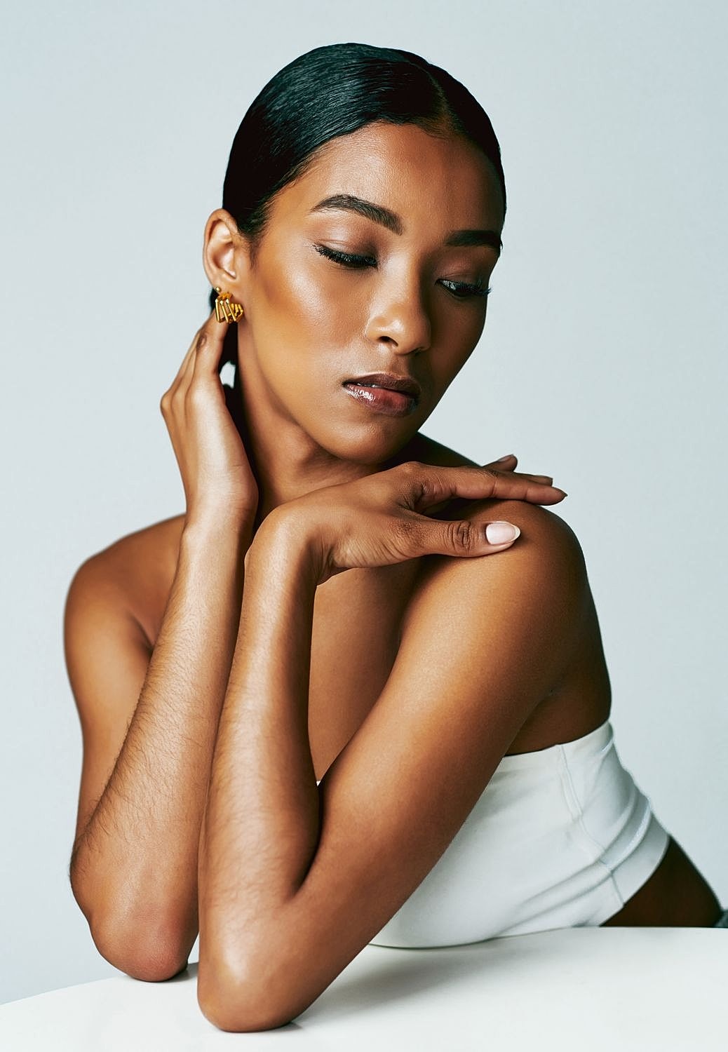 Elegant portrait of a woman with minimalist styling.