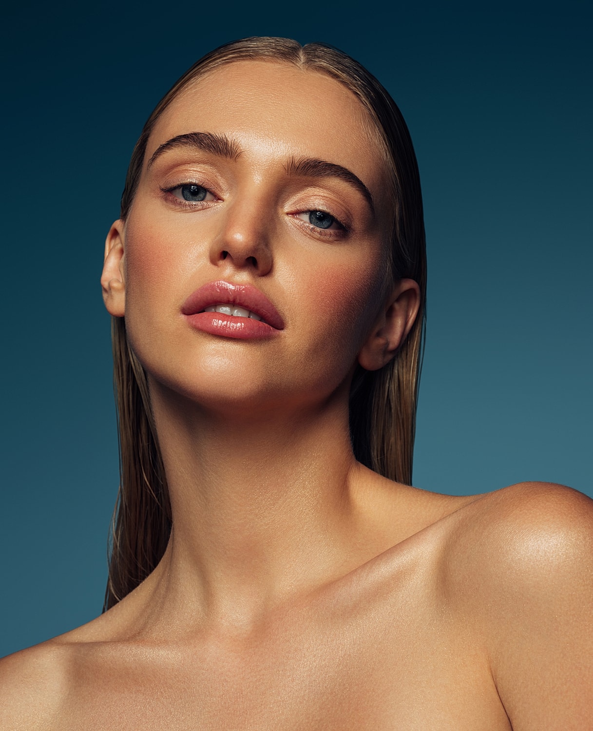 Portrait of a woman with smooth skin and hair.